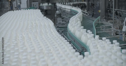 Conveyor with milk bottles 
Milk production