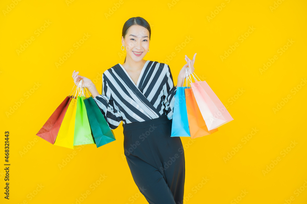 Portrait beautiful young asian woman smile with shopping bag Portrait beautiful young asian woman smile with shopping bag
