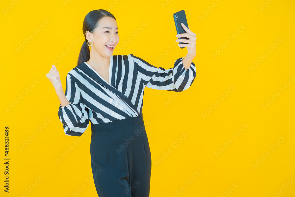 Portrait beautiful young asian woman smile with smart mobile phone Portrait beautiful young asian woman smile with smart mobile phone