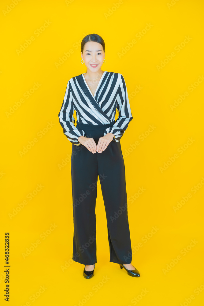 Fototapeta premium Portrait beautiful young asian woman smile with action