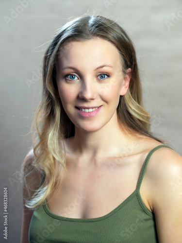 portrait of actress and director Yanna Mazazolina on a gray-blue background photo