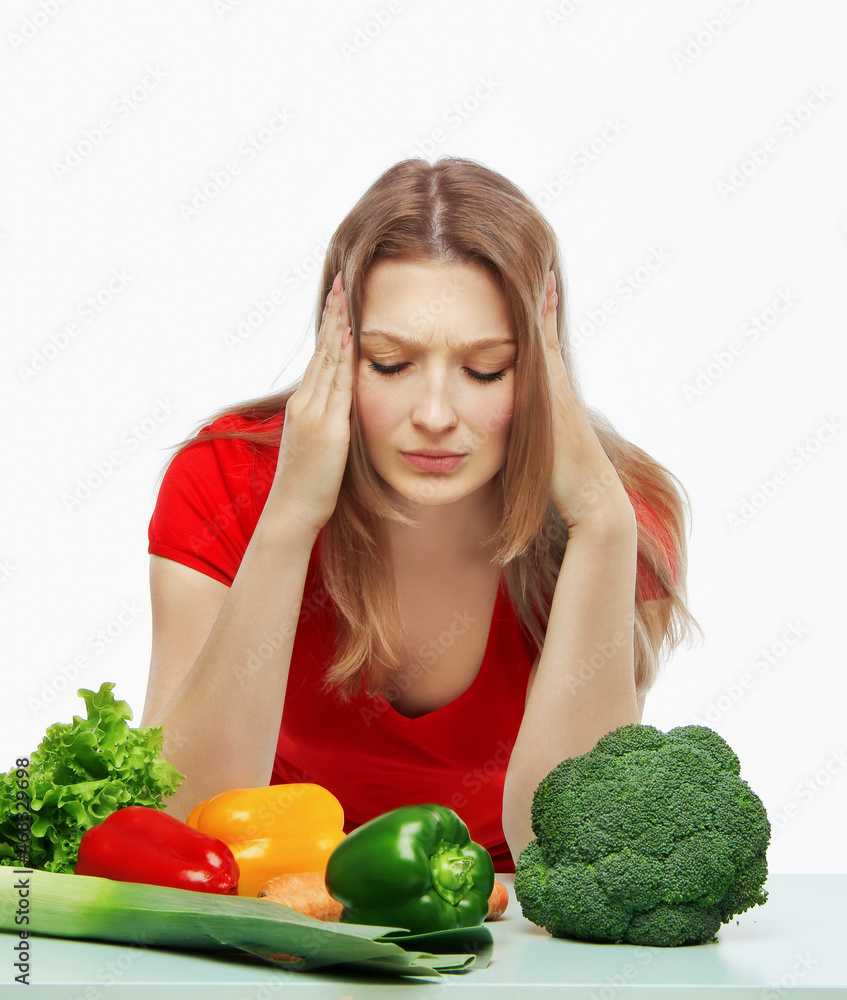 Girl with vegetable groceries .young woman holding a bag of groceries from the grocery store Girl with vegetable groceries .young woman holding a bag of groceries from the grocery store