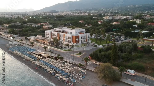 Aerial seaside view over seaside city of Kalamata, Greece at sunset photo