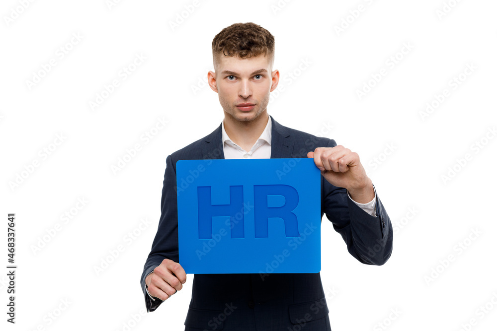 A businessman shows an inscription: HR A businessman shows an inscription: HR