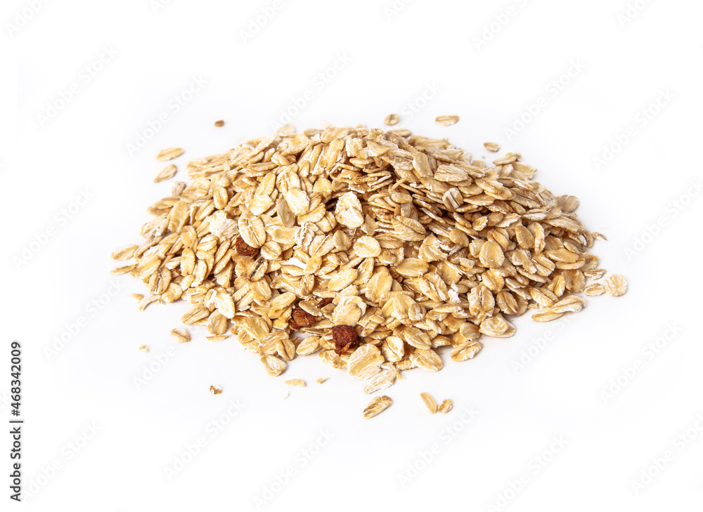 Oat flakes uncooked in white bowl on white background concept Oat flakes uncooked in white bowl on white background concept