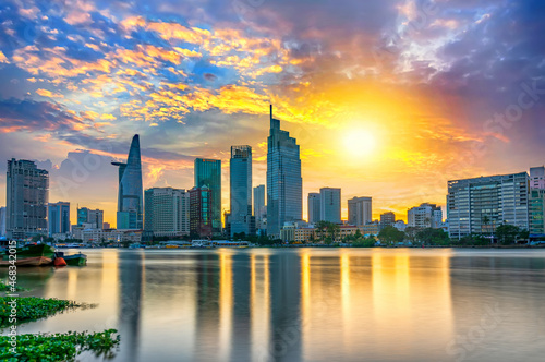 Riverside urban area at sunset sky after a period of social distancing because of the pandemic has revived in Ho Chi Minh City, Vietnam © huythoai