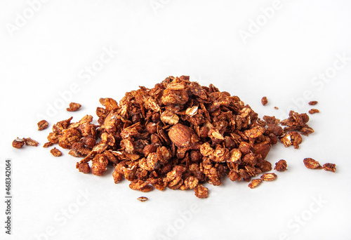 Crispy granola or muesli with chocolate isolated on white background