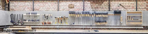 Fotografie, Tablou Banner panorama wall mechanic tools in garage for work