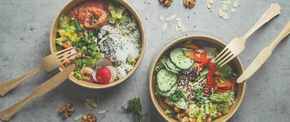 Japans poke bowl with seafood and salad and vegan bowl with vegetables and chickpeas in sustainable food container at grey background. Eco-friendly delivery food with plastic free cutlery. Top view.