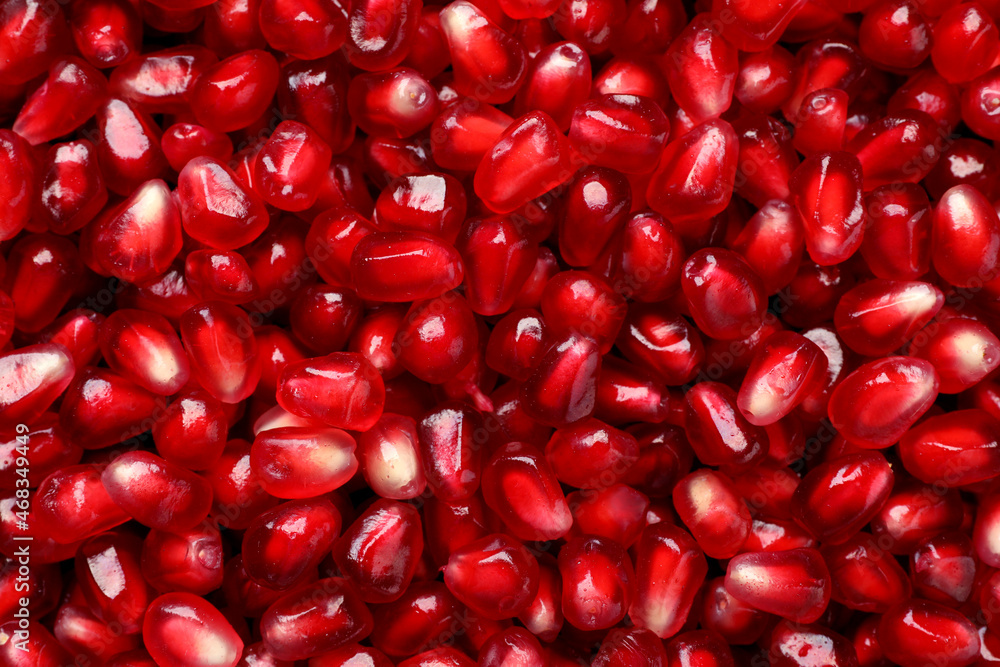 Tasty pomegranate seeds as background, top view Tasty pomegranate seeds as background, top view