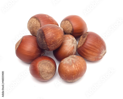 a bunch of hazelnuts isolated on a white background