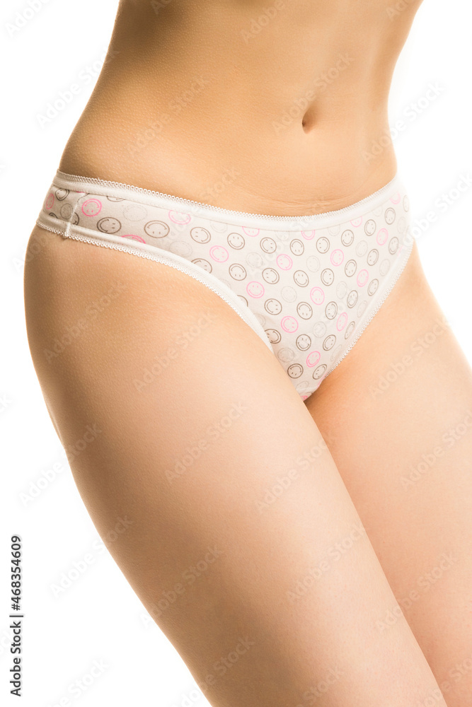 women's health concept, girl in panties on white background women's health concept, girl in panties on white background