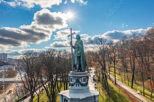 Sunny day view on Saint Vladimir Monument with beautiful autumn clouds, Kiev, Ukraine.