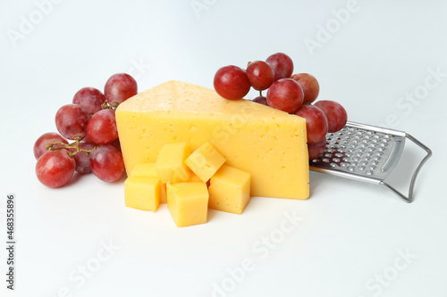 Fotografie, Tablou Concept of cooking eating with hard cheese on white background