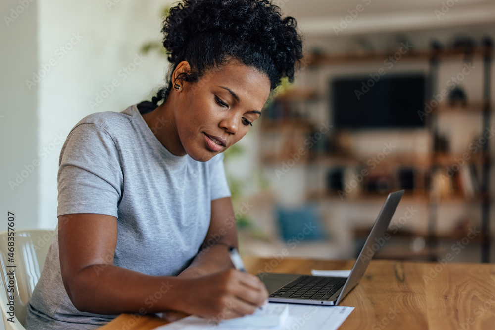 Serious african-american woman, going job hunting Serious african-american woman, going job hunting