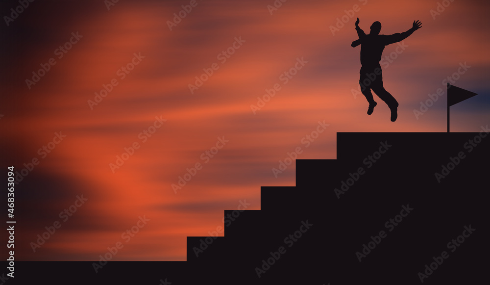 Happy Businessman jumping for joy on the Top of the Stairs at sunset. Successful Young Business man Success Concept 