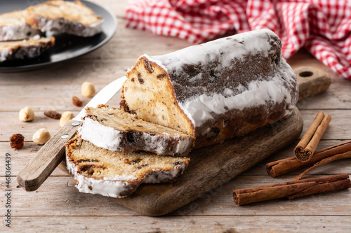 Traditional German Christmas stollen on wooden table 