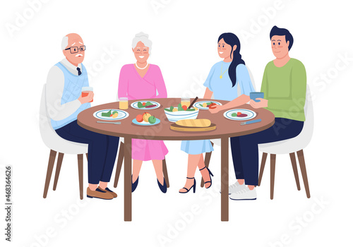 Family members having dinner together semi flat color vector characters. Full body people on white. Family mealtime isolated modern cartoon style illustration for graphic design and animation