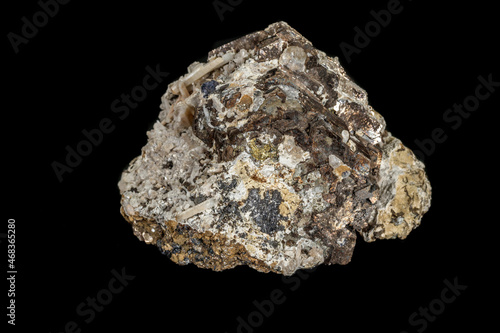 Macro stone mineral pyrite and quartz on a black background