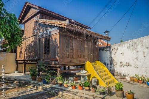 A traditional Malay house with a typical Melaka tiled staircase.