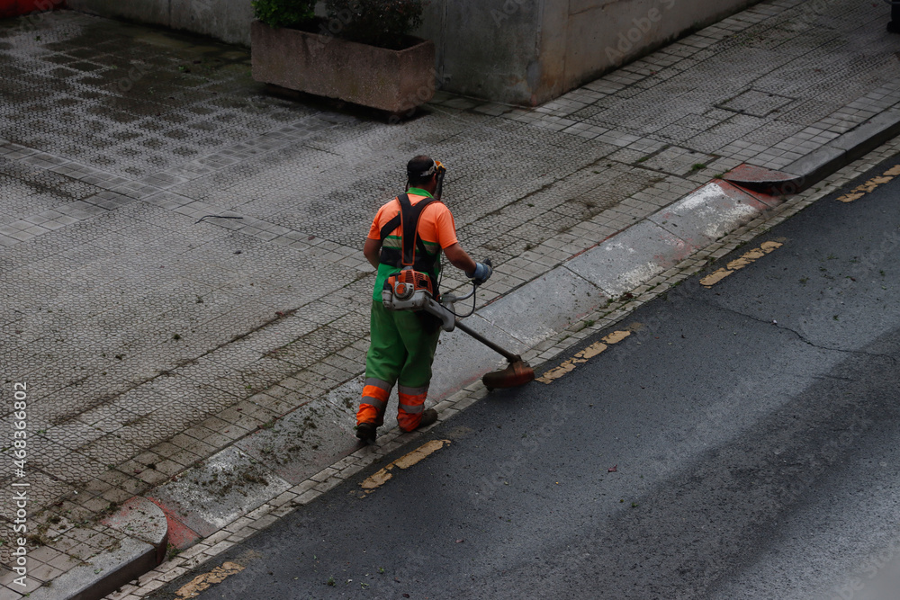 Gardener working in the street Gardener working in the street