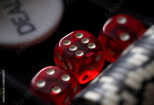 red playing dice, poker plastic chips, close-up, macrophotography, selective focus, blurry background, risk concept, stock exchange game, casino, gambling, gambling, excitement