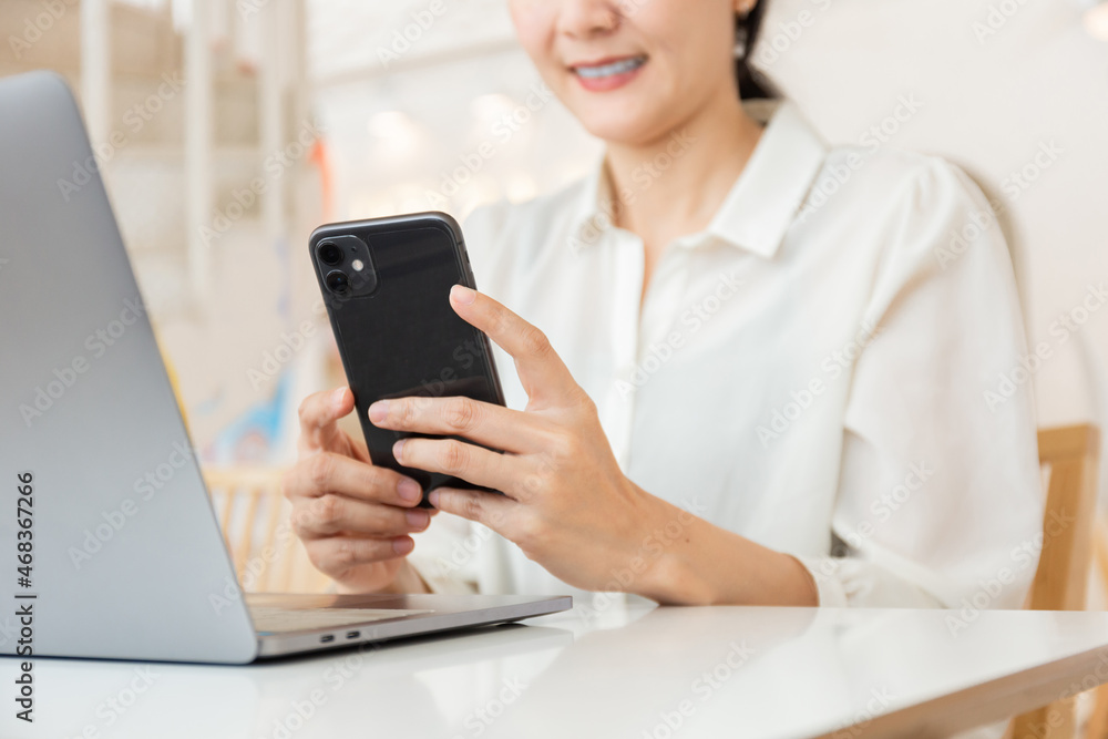 woman work using texting cell phone typing computer.student study education online learning.adult professional chatting on laptop,mobile contact us at Thinking business plan.connecting people concept woman work using texting cell phone typing computer.student study education online learning.adult professional chatting on laptop,mobile contact us at Thinking business plan.connecting people concept