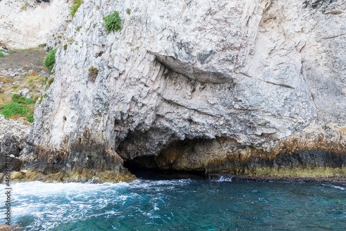 A cave in the limestone rock on the island of San Domino of the archipelago of the Tremiti Islands, Puglia, Italy.
