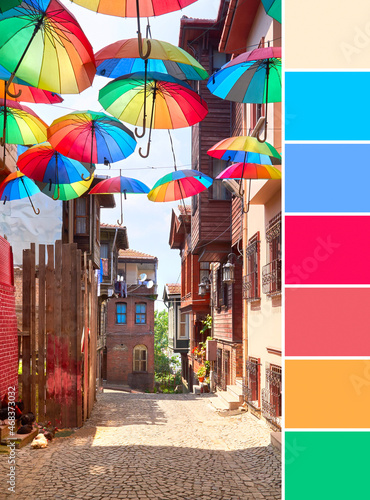 Color matching rainbow palette from image of rainbow umbrellas on display above the walkaway, narrow obbled pedestrian street in Istanbul, Turkey.