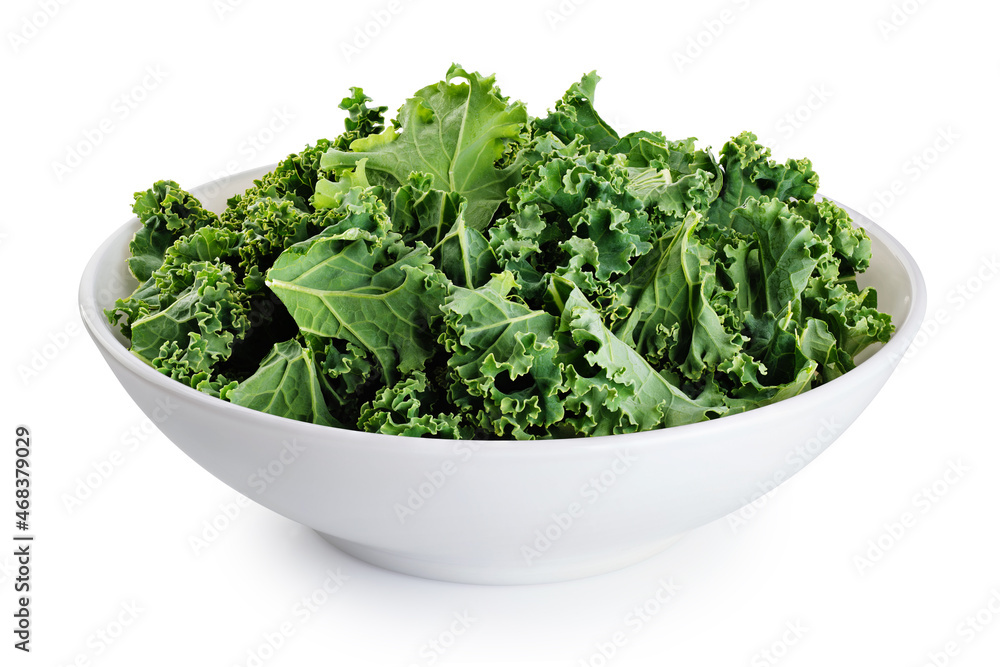 Bowl with kale leaves isolated on white background. With clipping path. Bowl with kale leaves isolated on white background. With clipping path.