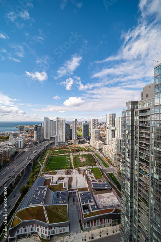 Toronto skyline Gardiner expressway and parks in the city blue sky and clouds  photo