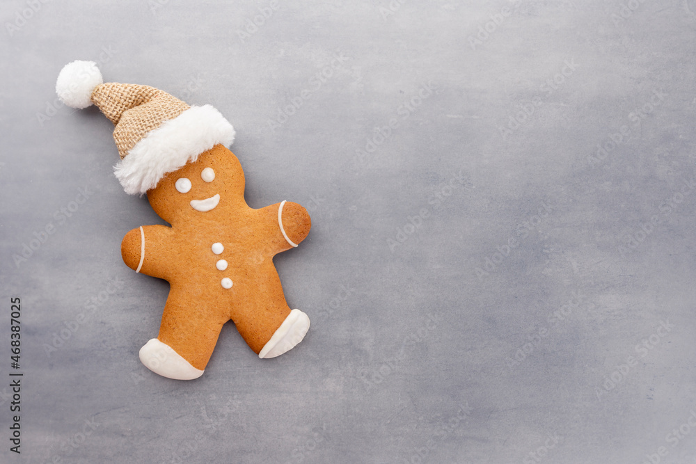 Gingerbread man, cookies and Christmas decor on pastel background. Gingerbread man, cookies and Christmas decor on pastel background.
