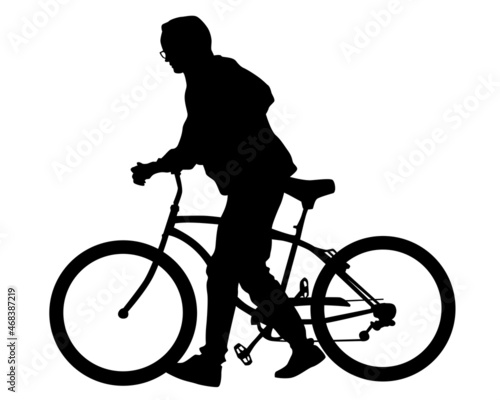 Young athlete on a bike for extreme stunts. Isolated silhouette on a white background