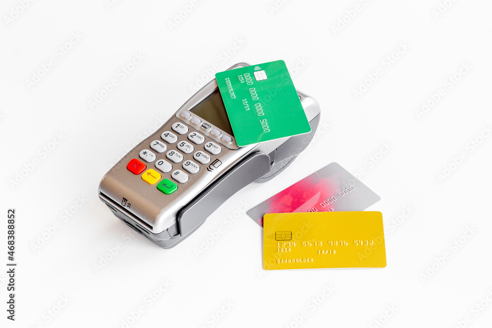 Pos payment terminal with credit card. Paying for shopping. E-commerce and business Pos payment terminal with credit card. Paying for shopping. E-commerce and business