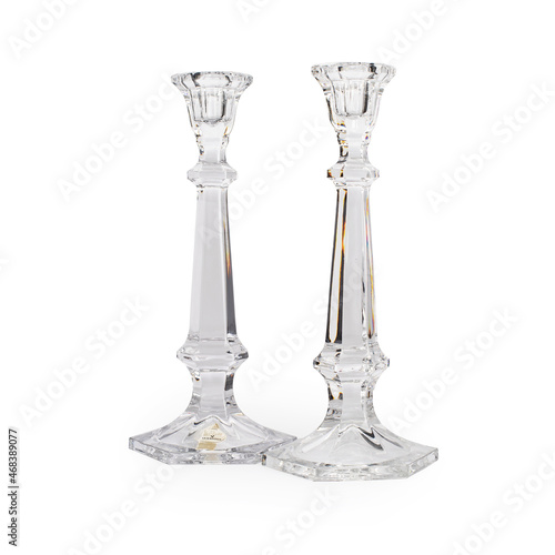 Vintage glass candlestick on white background © OsiecK