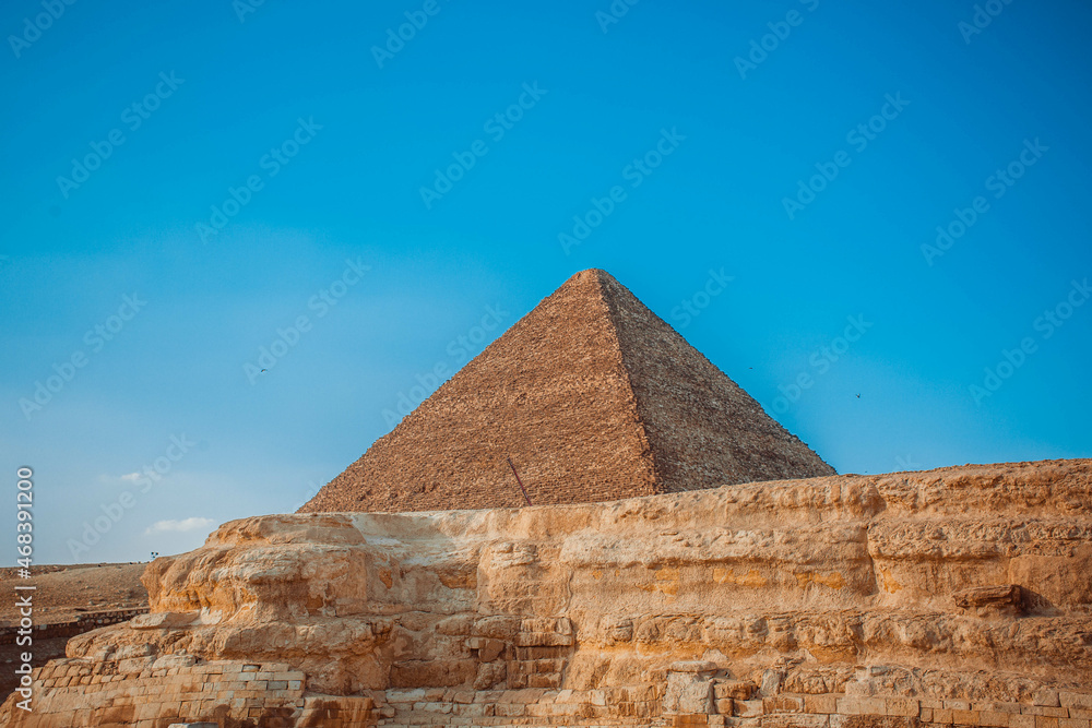 Pyramid of Egypt against the sky. Ruin
