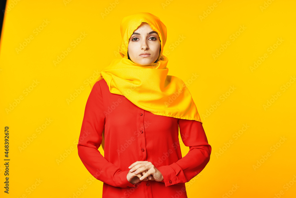 muslim woman wearing yellow hijab posing ethnicity yellow background muslim woman wearing yellow hijab posing ethnicity yellow background