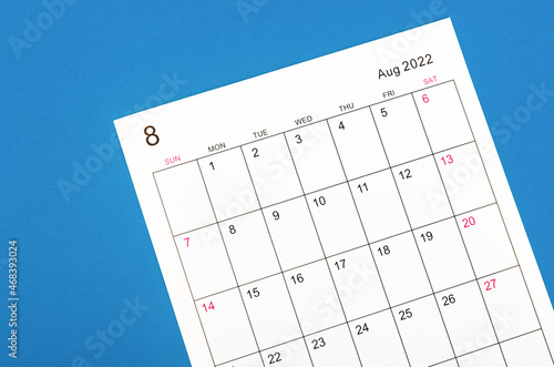 August 2022 calendar sheet on bule background. © gamjai