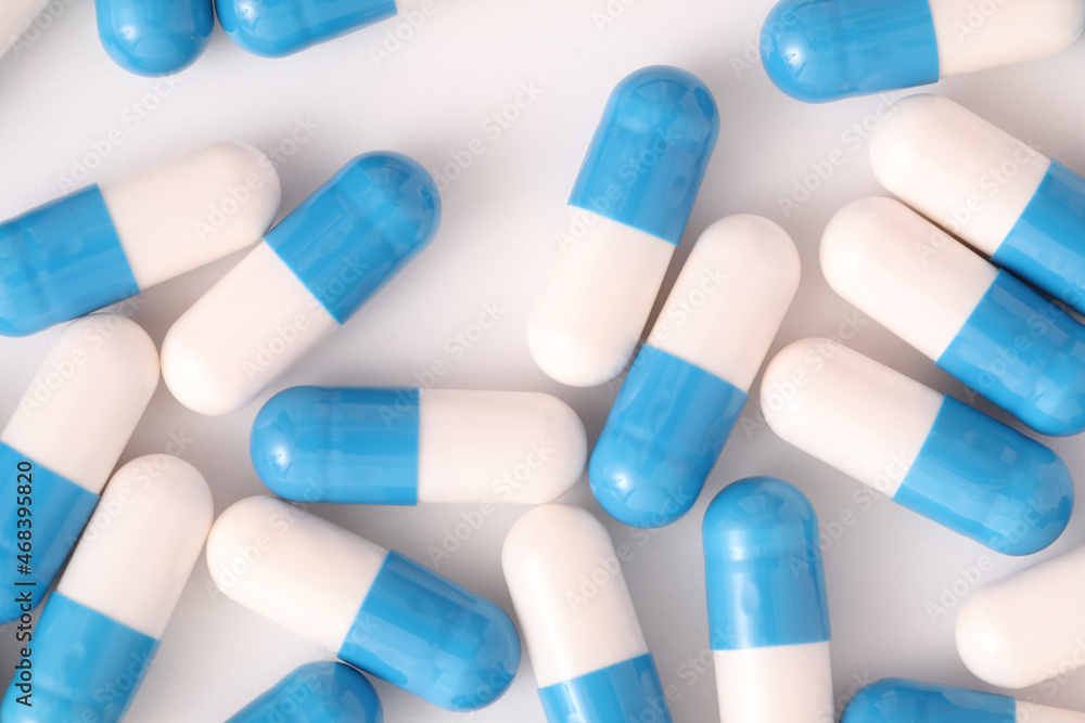 pills capsules close up on top view isolated in white background pills capsules close up on top view isolated in white background