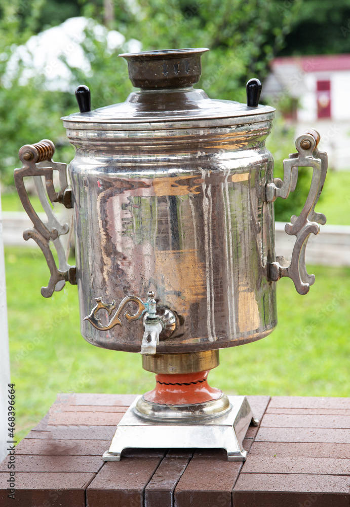 Large chrome-plated bronze samovar for water heating and tea drinking, close-up