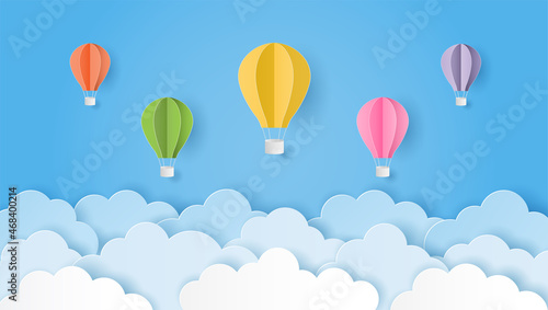 Fotografia Paper art style of colorful hot air balloons and cloud on blue sky