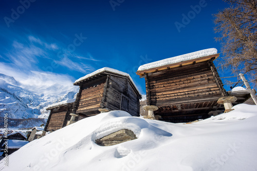 Snow-covered barns in Saas-Fee (Valais, Switzerland) photo