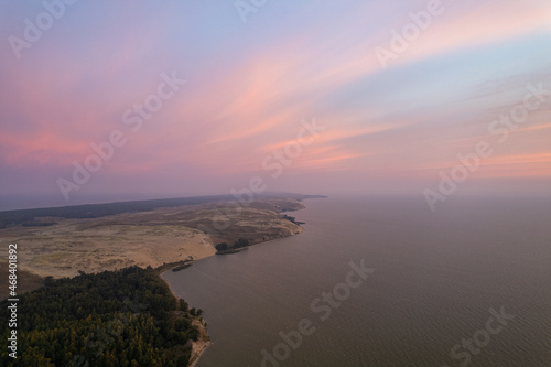 Fototapeta Naklejka Na Ścianę i Meble -  Aerial autumn fall sunrise view of Dead (Grey) Dunes in Curonian Spit, Lithuania