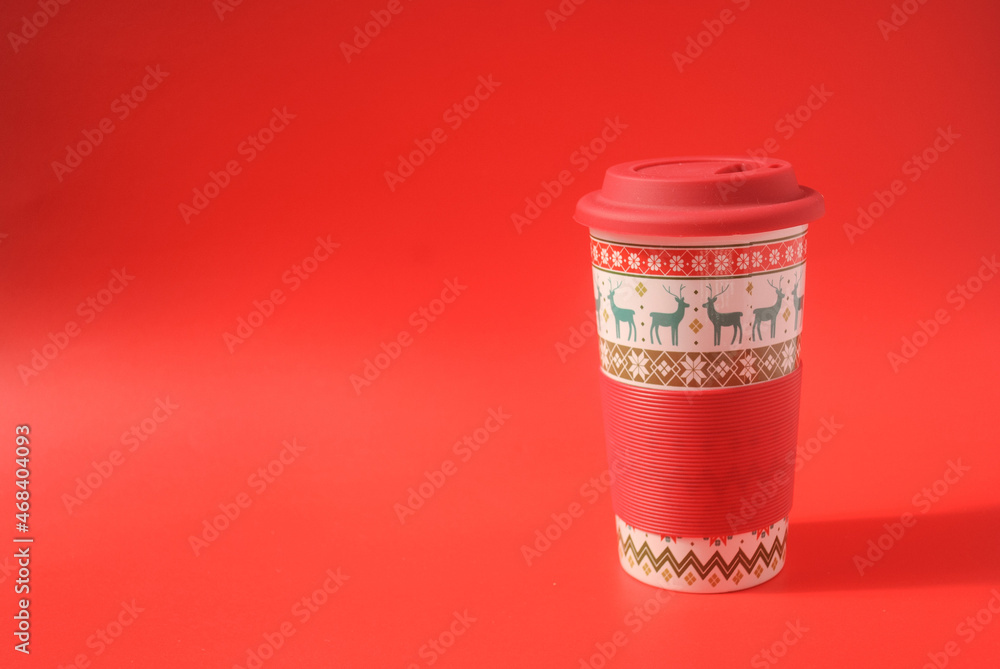 Christmas cup of coffee in a red background Christmas cup of coffee in a red background