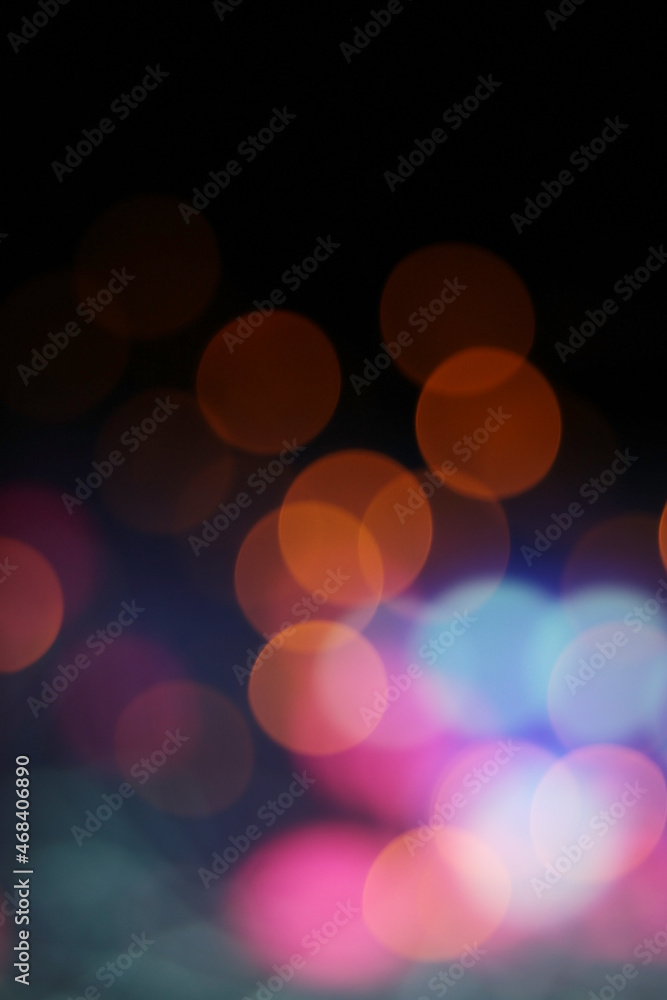 blurred pink, blue and orange abstract Christmas lights background