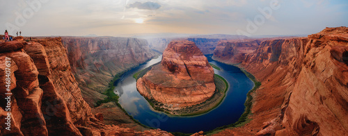 Close to the edge. Panoramic view at Horseshoe Bend, a meander of Colorado river in Grand Canyon National Park, Arizona photo