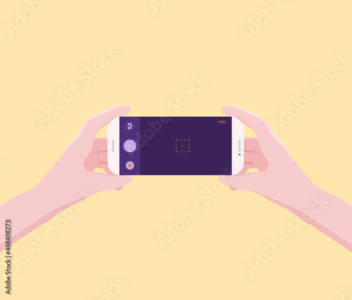 A young man is shooting a video using his smartphone.
Illustration about Record video with smartphone.