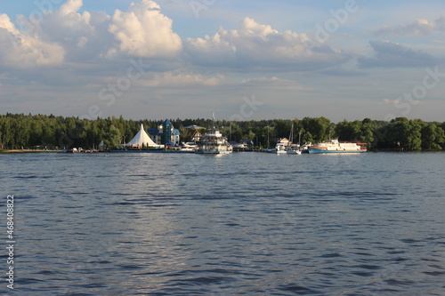 View from the Moskva River - forest, country restaurant, pleasure boat