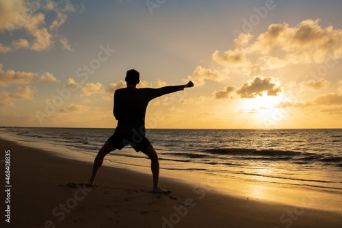 Man Enjoying the Brazilian Sunset Beach  