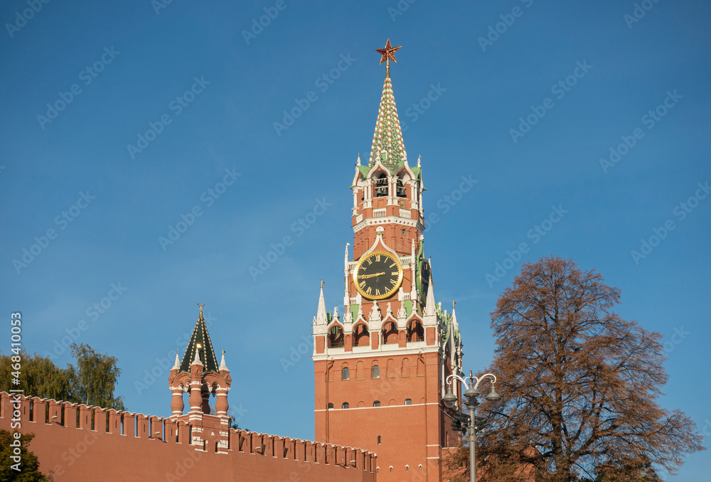 The Kremlin's Spasskaya Tower illuminated by the morning sun The Kremlin's Spasskaya Tower illuminated by the morning sun